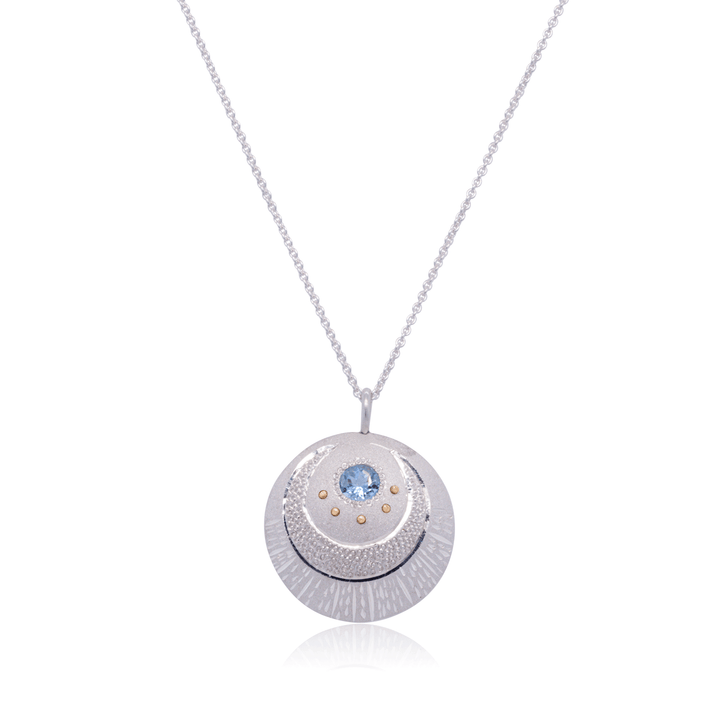 Midnight Dreamer Pendant Necklace in sterling silver with blue topaz, handcrafted celestial-inspired jewellery by Janine Jewels.